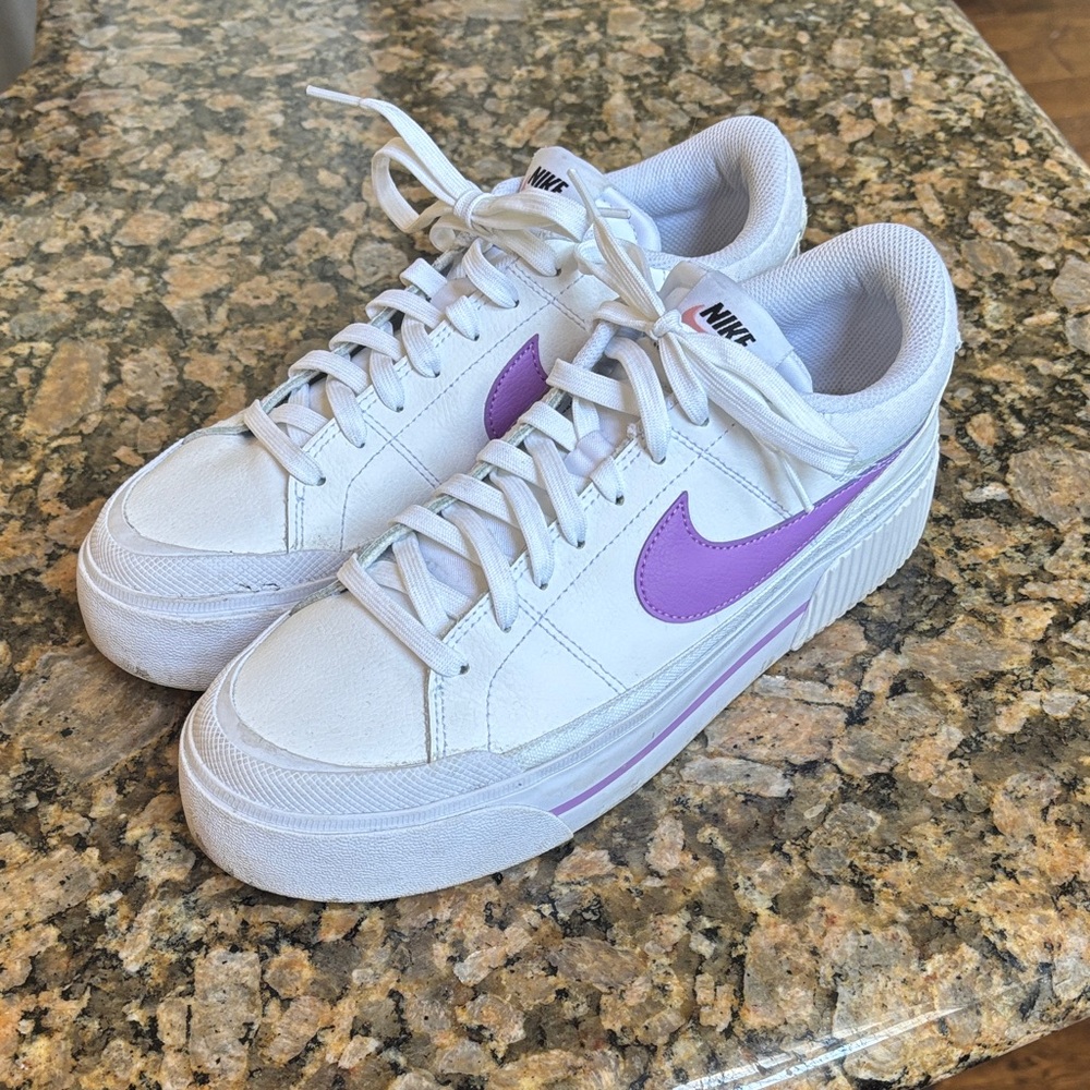 Nike Women’s White Low-Top Sneakers with Purple Swoosh